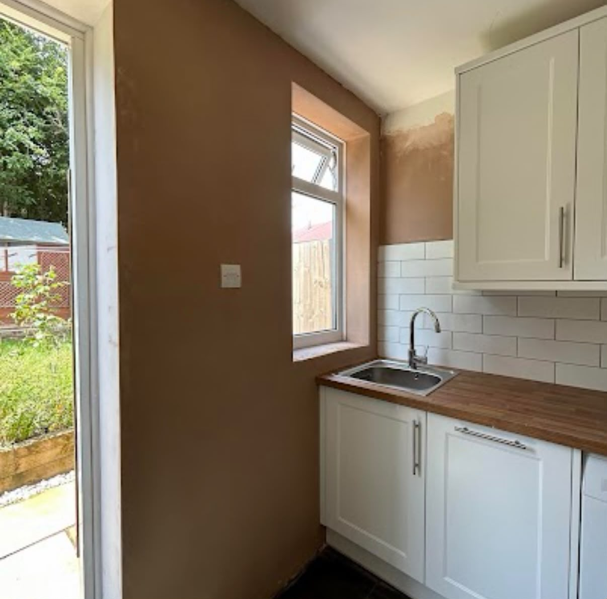 Kitchen wall plastered ready for decorating